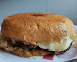 Foto del paso 12 de la receta: Sándwich🥯de cebolla🧅y tocineta🥞 caramelizada🥓con queso🧀en pan de almojábana🥯