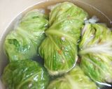 A picture of step 4 of Ground meat rolled in cabbage leaves.