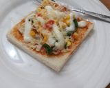 Foto langkah ke 4 dari resep Roti Pizza Tuna Melted.