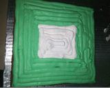 A picture of step 4 of Pakistan Flag Cake 🎂.