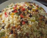 Foto del paso 4 de la receta: Arroz navideño con tocineta y plátano maduro
