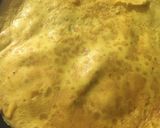 Foto del paso 3 de la receta: OMELET🌮(relleno de panceta ahumada, queso y aceitunas)🌮Y en homenaje al DÍA INTERNACIONAL DEL HUEVO🥚