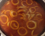 Foto del paso 3 de la receta: Calamares en su tinta con arroz blanco