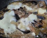 Foto del paso 4 de la receta: Berenjenas🍆en salsa de ajo🧄, miel🍯y queso🥯🧀🍆