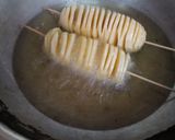 A picture of step 13 of Cheese,Pepper And Salt,Chilli Garlic and Mayo Potato Tornadoes.