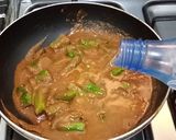 A picture of step 13 of Stuffed Chilli Curry.