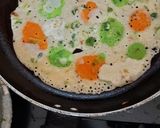 A picture of step 6 of Polka dots cheela.