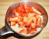 A picture of step 4 of Rice flour pancakes with frozen banana yogurt and strawberry sauce.