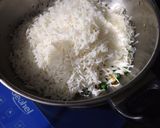 A picture of step 3 of Aam Ada Corn Rice.
