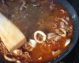 Foto del paso 7 de la receta Fideuà integral con calamares y langostinos