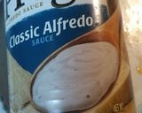 A picture of step 4 of Bagel Alfredo Sauce Pizza.