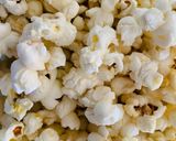 A picture of step 3 of Low-Calorie Microwave Popcorn.