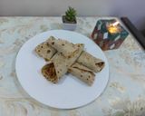 A picture of step 4 of Roti chicken garlic sauce rolls.