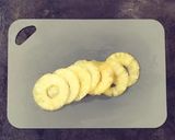 Foto del passaggio 5 della ricetta Sfogliatine con budino alla vaniglia ananas e amaretti