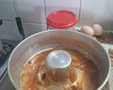 Foto del paso 1 de la receta: Budín de pan y ciruelas pasas decorado con dulce de leche