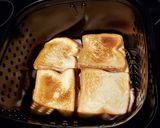 A picture of step 3 of Air Fryer Ham & Cheese Sandwiches.