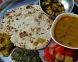 A picture of step 3 of #cook pad india#jowar pulka roti,Dal,Kutra saag,kundru,pickle.