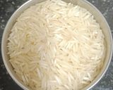 A picture of step 1 of A bowl Of Steaming Hot Basmati Rice In A Pressure Cooker.