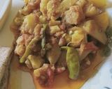 A picture of step 7 of Achari aloo gobhi.
