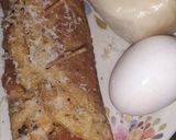 A picture of step 9 of Cheesy egg roll.