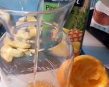 A picture of step 2 of Pineapple Pinacolada.
