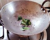 A picture of step 1 of Seyal phulka (leftover rotis in garlic tomato curry).