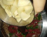 A picture of step 2 of Vegetable daliya.