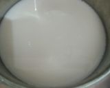 A picture of step 1 of Mawa Raisin Kheer.