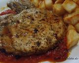 Foto del paso 10 de la receta Chuletas de cerdo a la provenzal