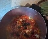 A picture of step 1 of Wrap with mince, lettuce and cheese.