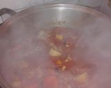 Foto del paso 11 de la receta: Estofado de cerdo con chorizo colorado y porotos negros y blanco