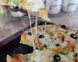 A picture of step 4 of Chicken Tikka Pizza 🍕🧀🍕.