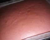 A picture of step 7 of Strawberry milk cake with whipped cream frosting.