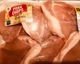 A picture of step 1 of Smothered Pork Chops.