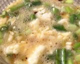 A picture of step 2 of Chessy green onion omelet.