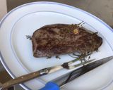 A picture of step 10 of Beef Filets with Marinated Garlic, Thyme, and Rosemary.