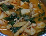 A picture of step 5 of Red Curry Chicken with Bamboo Shoots and Coconut Milk.