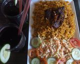 A picture of step 5 of Party jollof Rice.