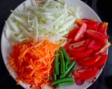 A picture of step 1 of Som Tam / Thai Green Papaya Salad.