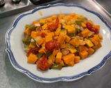 A picture of step 14 of Sweet Potato with Green Bell Pepper and Tomatoes in Fruity Sauce.