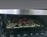 A picture of step 3 of Baked French fries wheat base pizza.