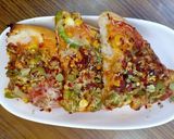 A picture of step 7 of Desi Pizza.