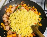A picture of step 8 of Timeless chicken noodles and sausage dinner.