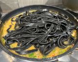 A picture of step 4 of Tagliolini al nero di seppia con granchio – Venetian squid ink tagliolini with crab.