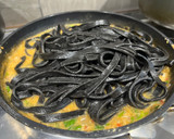 A picture of step 4 of Tagliolini al nero di seppia con granchio – Venetian squid ink tagliolini with crab.