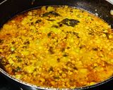 A picture of step 6 of Soya granules with potato and fresh green peas.