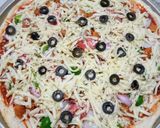 A picture of step 4 of Chicken Tikka Pizza.