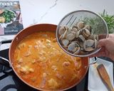 A picture of step 7 of Monkfish Stew with Shrimp and Clams.