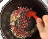 Foto del paso 4 de la receta: Arroz criollo de pollo, jamón serrano y curry en olla FussionCook FC7Smart