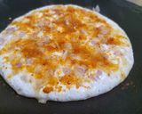 A picture of step 4 of Onion Podi Uttapam.